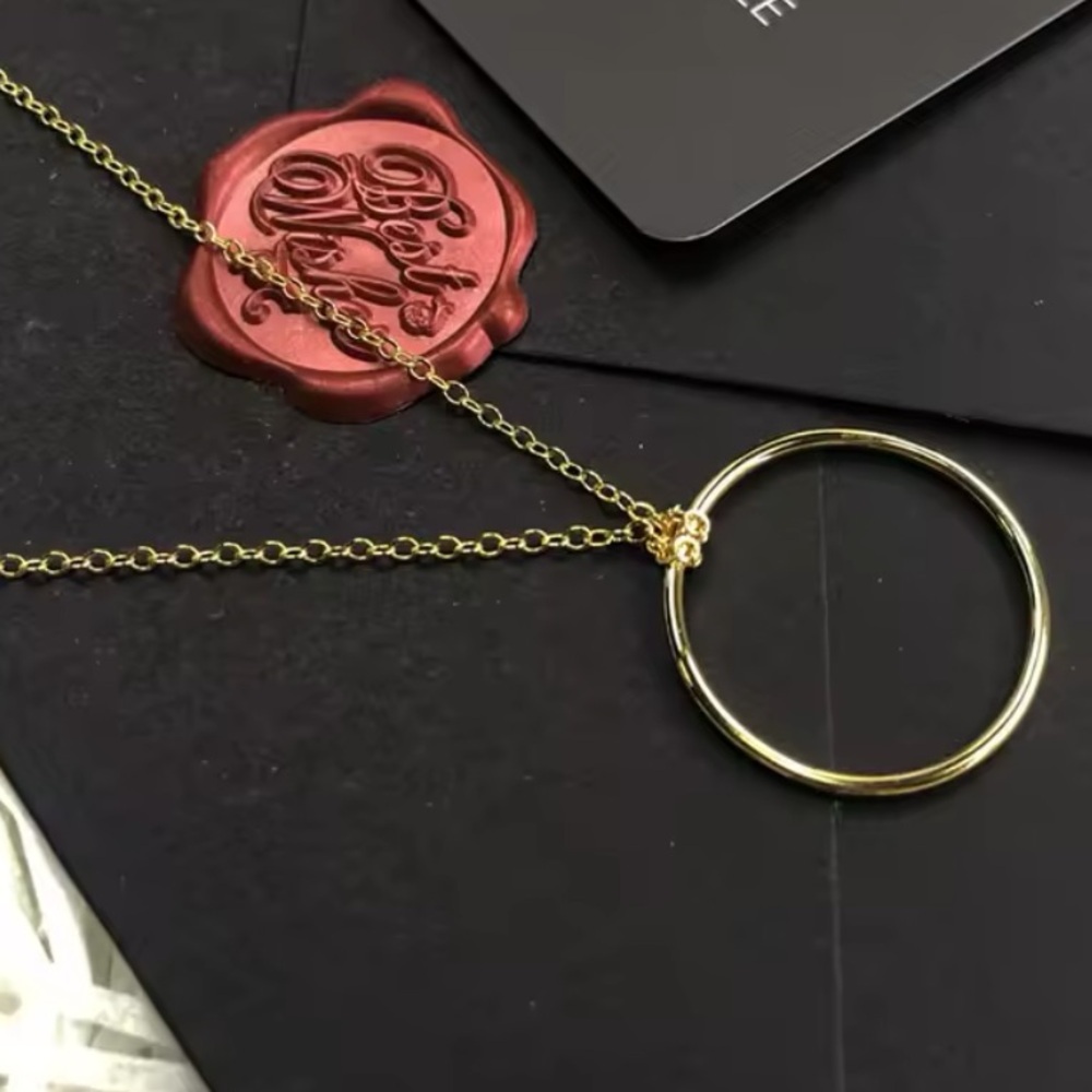 NWOT Sterling Silver yellow gold plated charm circle necklace